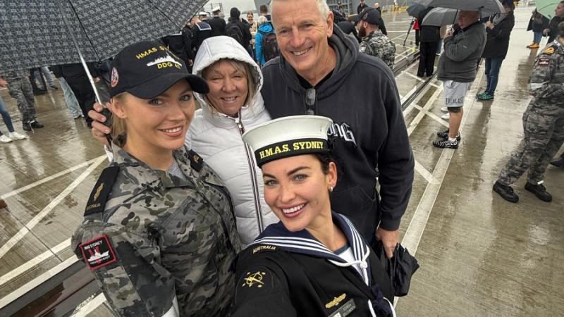 Family and friends of HMAS Sydney’s crew welcome them on the wharf of Fleet Base East after four-and-a-half months at sea.