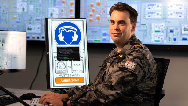 Sub-Lieutenant Louis Von Richter with a sound detection display he developed at the Technical Training Faculty, HMAS Cerberus, Victoria.