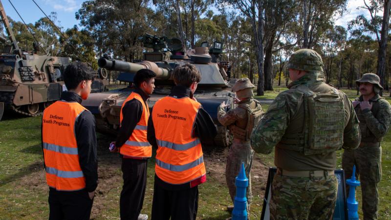 Students meet soldiers from the School of Armour.