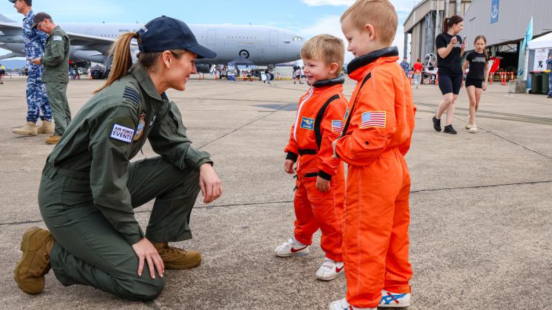 Group Captain Katherine Bennell-Pegg interacts with future Defence Space Command Astronauts at the RAAF Richmond Air Show 2025. Photo by CPL Cath Kelly.