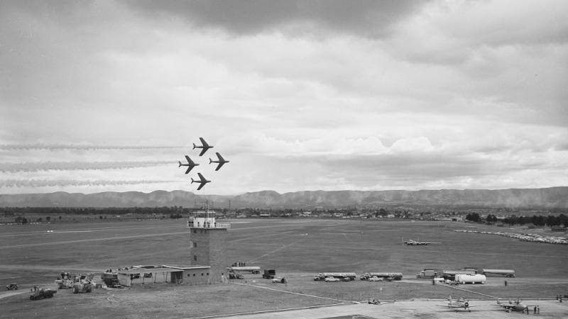 Four CA-27 Sabres from the No 75 Squadron 'Black Diamonds' aerobatic team perform a display over RAAF Base Richmond during Air Force Week air show in September 1961 (Photo courtesy of RAAF Museum)