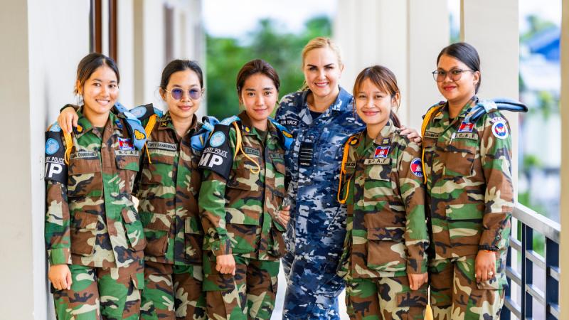 Six women, a Royal Australian Air Force officer at centre, and five Royal Cambodian Armed Forces personnel during Indo-Pacific Endeavour 2024.