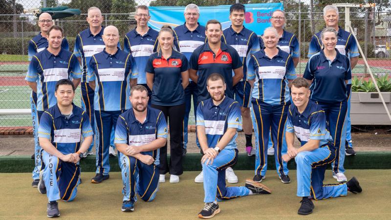 Air Force Bowls Association team members standing together in their team uniform, posing for a group photo.