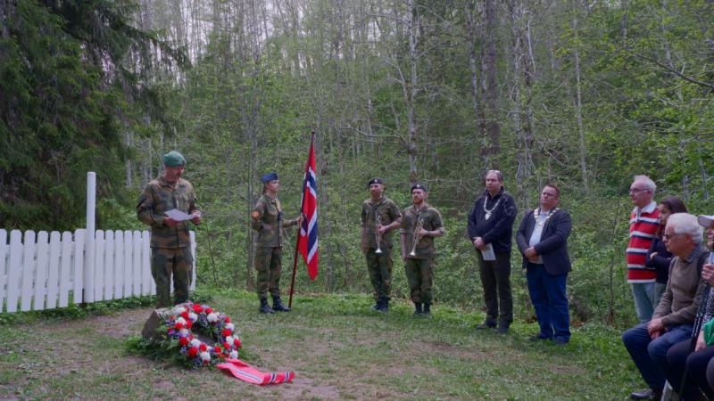 Norwegian Chaplain gives a speech during the 80th anniversary commemoration of Operation Doomsday.