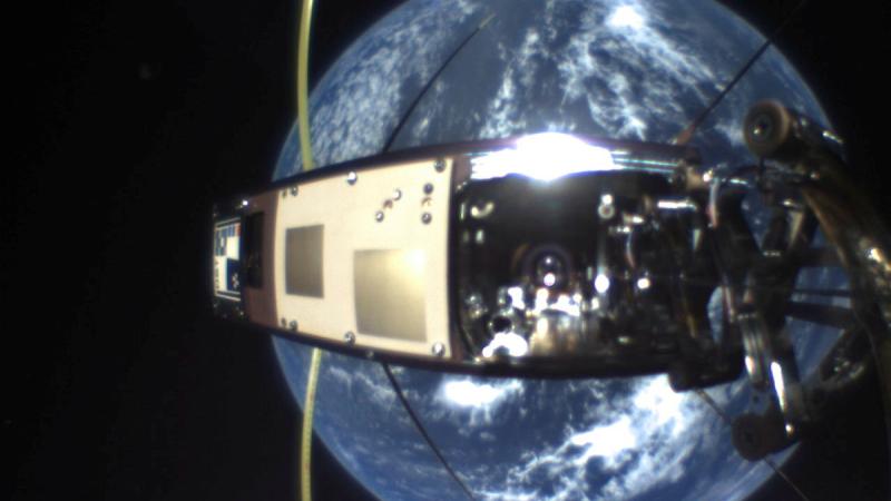 Earth appears as a round blue ball, from the view of a satellite.