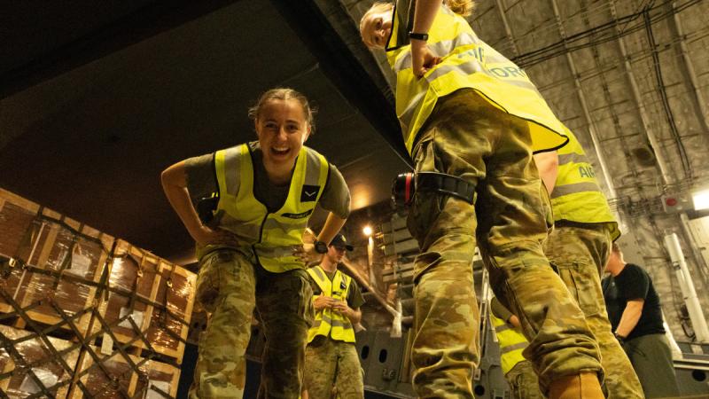 Royal Australian Air Force aviators help load cargo to a C-17A Globemaster at Ho Chi Minh City International Airport, Vietnam before deploying peacekeepers to South Sudan.