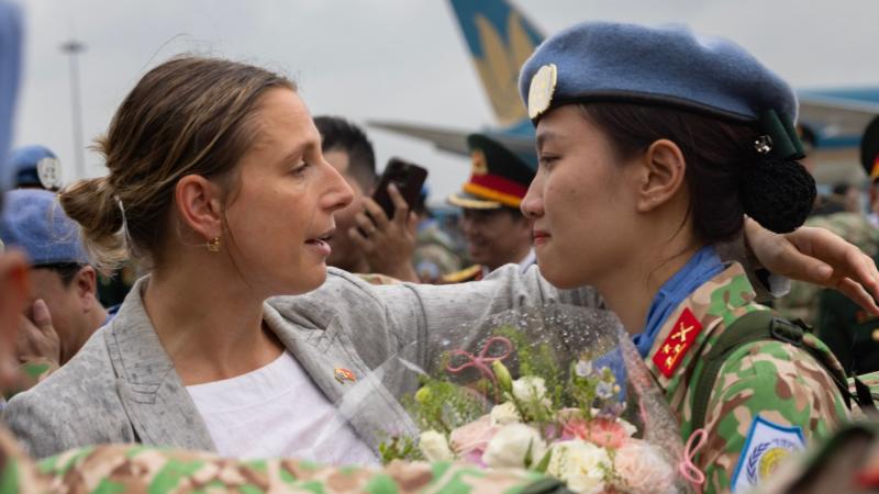 An Australian diplomate farewells a Vietnamese peacekeeper on deployment to South Sudan.
