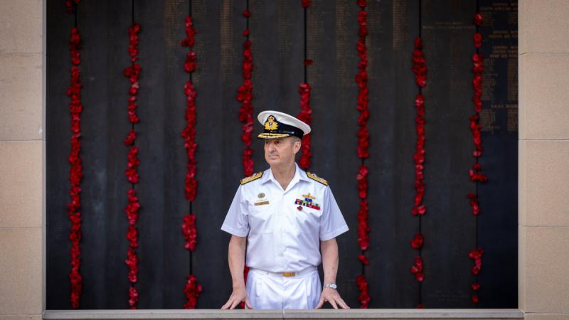 Chief of the Defence Force Admiral David Johnston stands in front of the Roll of Honour.