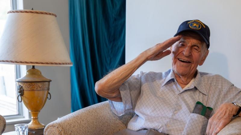 A World War 2 veteran celebrates turning 100.