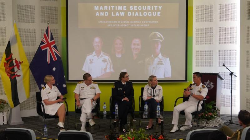 Australian representatives listen to a senior Royal Brunei Navy officer at a Maritime Security Workshop in Brunei. 