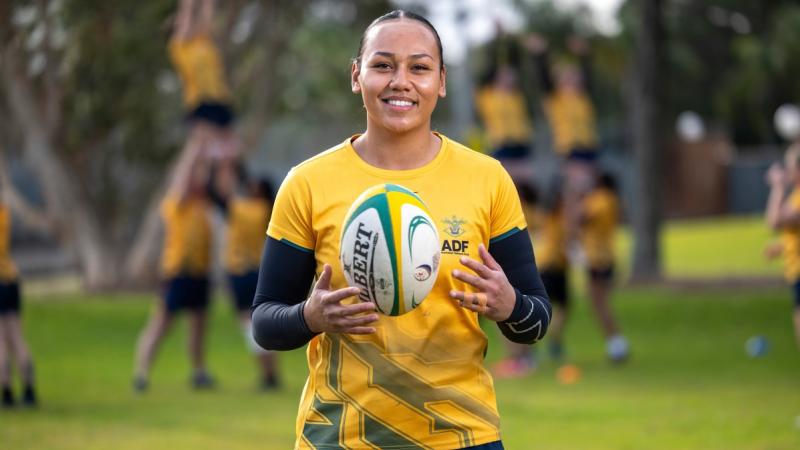 A Navy sailor trains for the ADF Women's Rugby team at Randwick, NSW.