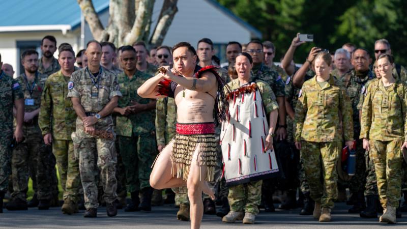 A Maori dancer welcomes soldiers to a Five Power exercise in New Zealand.