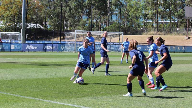 Air Frce and Navy women's teams clash in the ADF football championships.