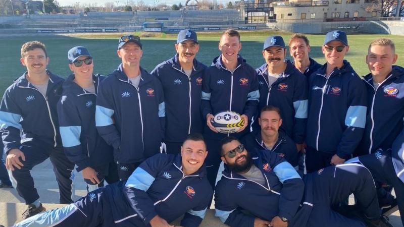 Emerson Burgess (holding the rugby ball) with his team mates during the 2020 Air Force rugby tour to the United States.