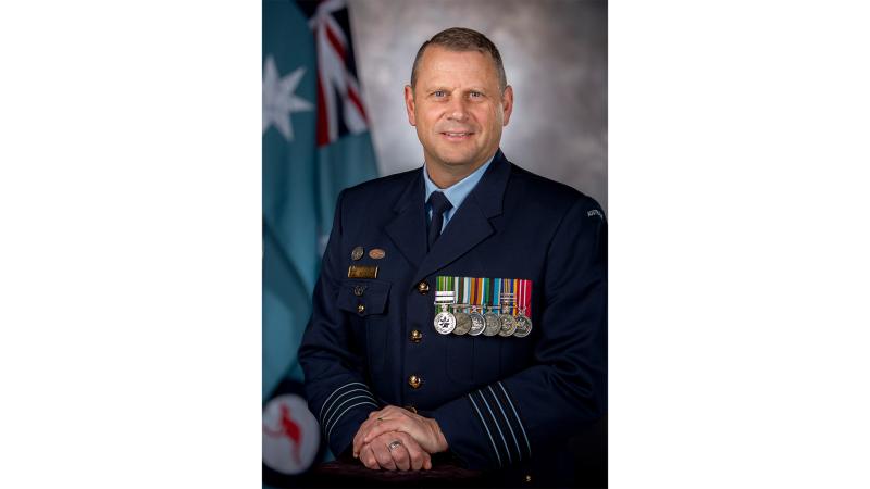 A portrait of a military member.