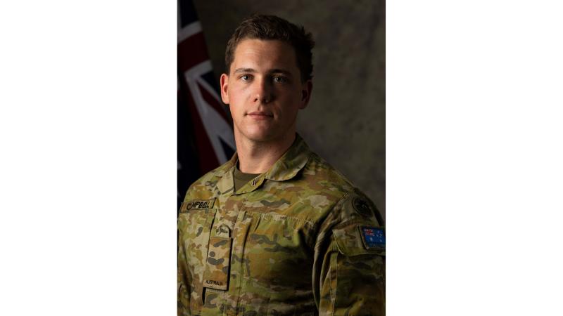 Private Bailey Campbell poses for a studio photo in Army uniform.
