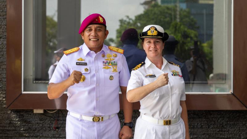 Brigjen TNI (MAR) Dian Suryansyah, S.E, M.Tr.Hanla., M.M. stands with Commanding Officer HMAS Toowoomba, Commander Alicia Harrison during the ship's visit to Jakarta, Indonesia.