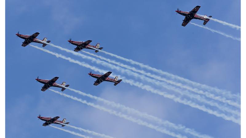 Six aircraft in flight formation.
