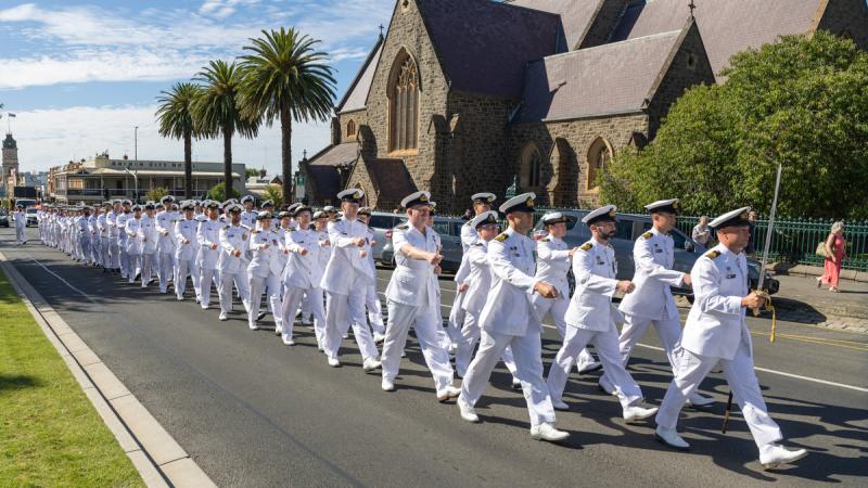 A long line of Navy sailors march through the streets of Ballarat.