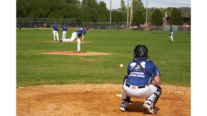 Men playing a game of baseball.