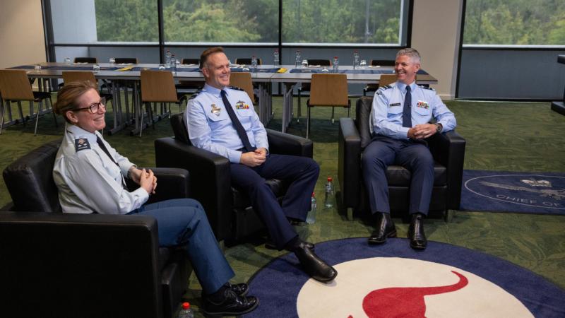 Chief of Air Force, Air Marshal Stephen Chappell DSC, CSC, OAM with Commander of the Royal Canadian Air Force Lieutenant-General Jamie Speiser-Blanchet, CMM, CD and New Zealand Chief of Air Force, Air Vice-Marshal Darryn Webb sitting in three arm chairs with a RAAF Roundel mat on the ground during the Air and Space Power Conference 2026, Canberra.