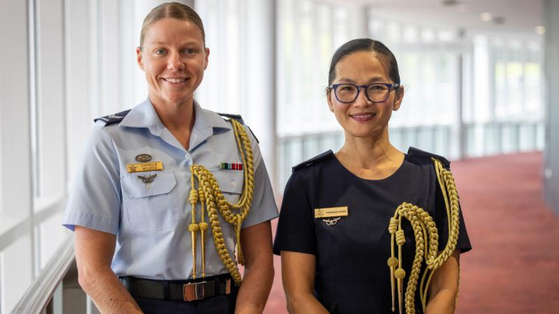 Two escort officers from the Australian Defence Force pictured together.