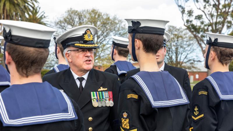 Navy Commodore inspects the guard.