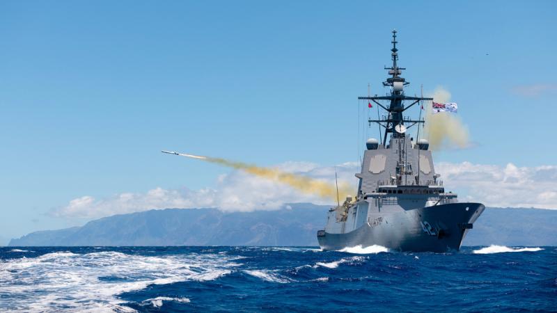 A ship fires a missile.