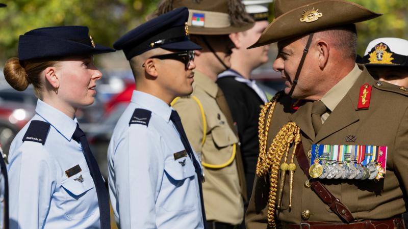 Major General Greg Novak talks to graduates of the space training course.