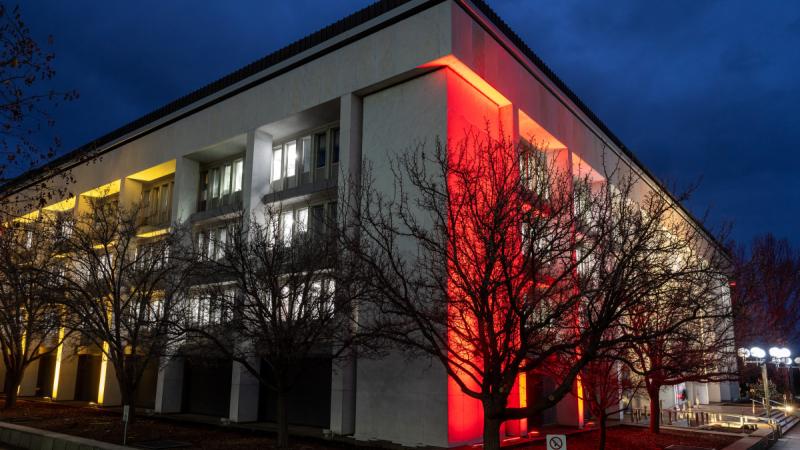 A building with coloured lights on it.