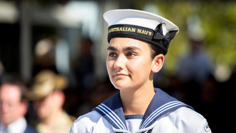 Navy recruit Shatarni Brown smiles and faces the camera.