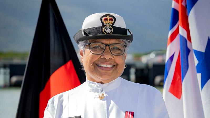 Navy Indigenous Development Program Elder, Petty Officer Frances Visini smiles and face the camera.