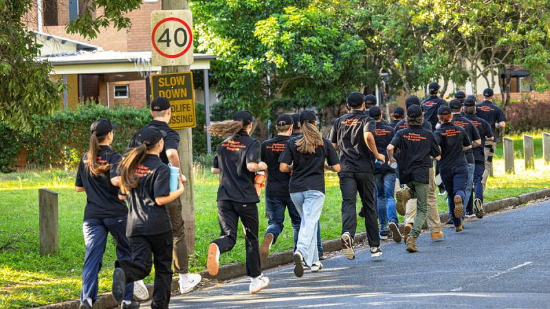 Year 10, 11 and 12 students drawn from schools across Southern Queensland run the streets near Gallipoli Barracks.