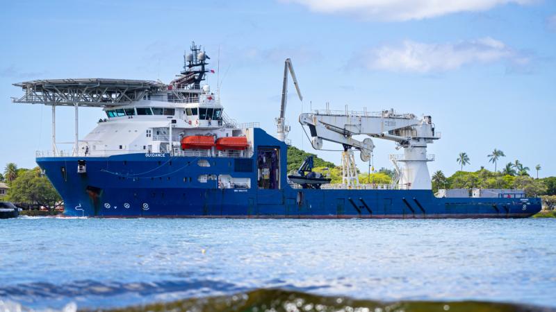 A ship alongside at a port.