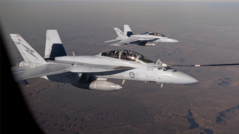 Two aircraft in flight.