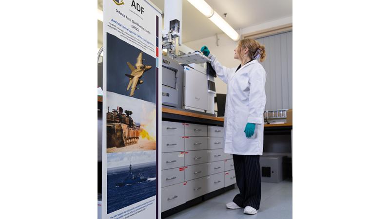 A scientist works in a lab.